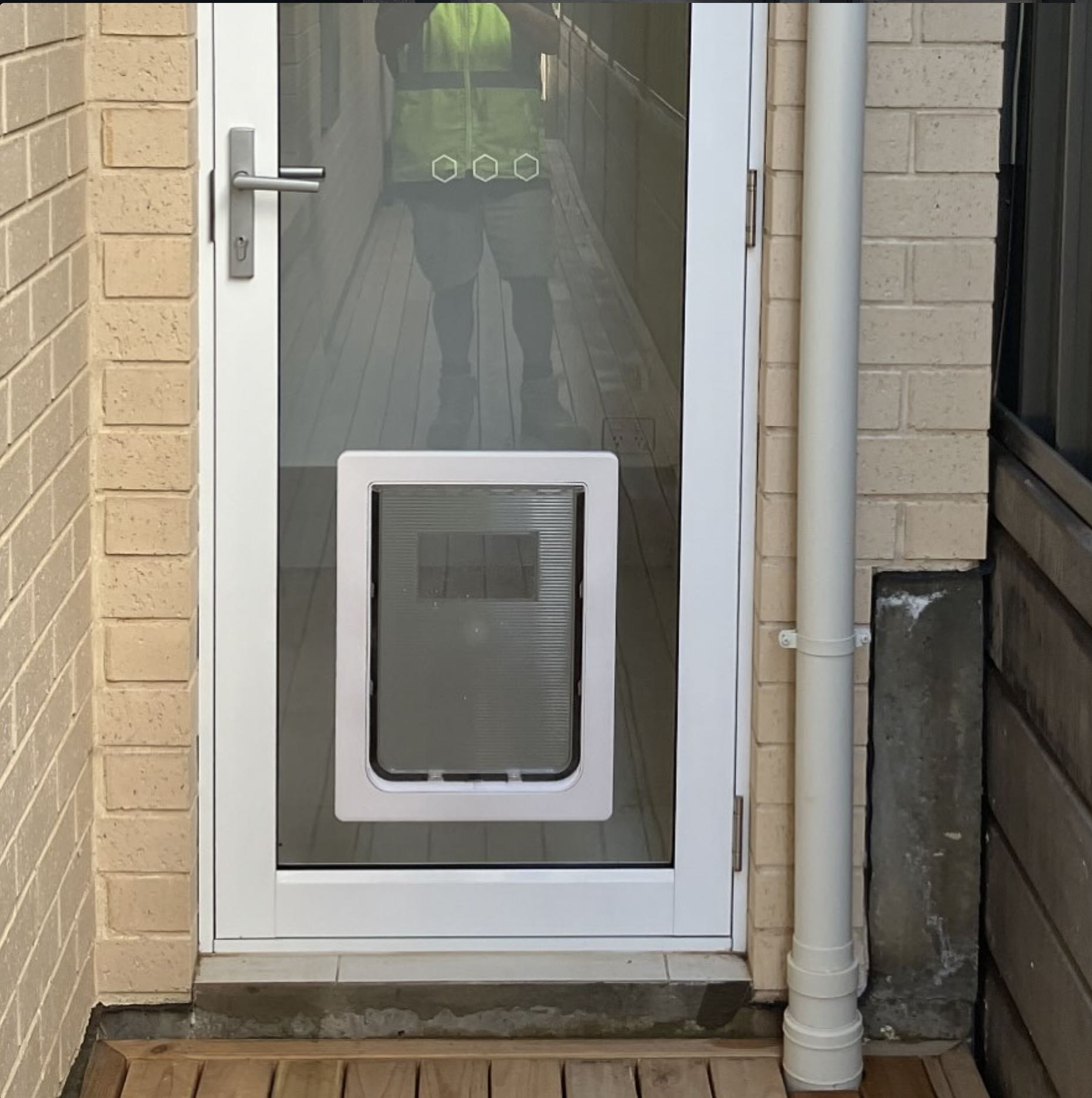 Large White Dog Door installed into a glass door in Adelaide by Dog Door Australia